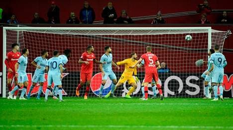 Atletico Madrid's Ghanaian midfielder Thomas Partey (C) scores an own goal during the UEFA Champions League Group D football match Bayer Leverkusen v Atletico Madrid in Leverkusen, western Germany on November 6, 2019. (Photo by INA FASSBENDER / AFP) (Photo by INA FASSBENDER/AFP via Getty Images)