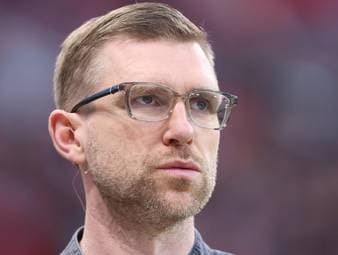 Der Deutsche Fußball-Bund hat Per Mertesacker als neuen Geschäftsführer Sport vorgestellt. Der Weltmeister von 2014 übernimmt den Posten zum 1. Januar 2027 und bildet gemeinsam mit Bundestrainer Jürgen Klopp und Sportdirektor Rudi Völler das neue sportliche Führungstrio des DFB.
