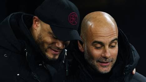 Vincent Kompany (li.) und Pep Guardiola