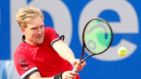 Matthias Bachinger hält in Metz die deutsche Fahne hoch