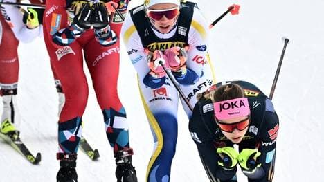 Gimmler (r.) und Rydzek auf dem Podest