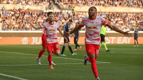 Bergamo, Italy, 14th April 2022. Christopher Nkunku of RB Leipzig celebrates with team mates after scoring to give the side a 1-0 lead during the UEFA Europa League match at Gewiss Stadium, Bergamo. Picture credit should read: Jonathan Moscrop Sportimage PUBLICATIONxNOTxINxUK SPI-1637-0011