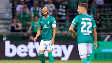 Ömer Toprak (l.) ist Kapitän bei Werder Bremen