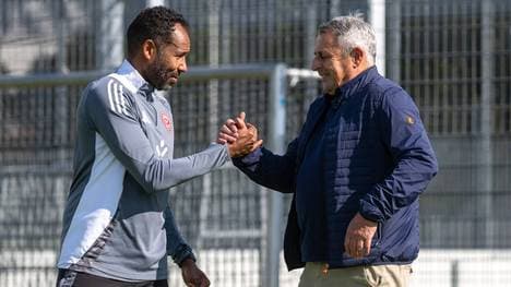 Klaus Allofs (r.) will mit Trainer Daniel Thioune verlängern