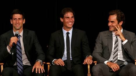 NEW YORK, NY - AUGUST 23:  Novak Djokovic of Serbia; Rafael Nadal of Spain and Roger Federer of Switzerland on stage during the ATP Heritage Celebration at The Waldorf=Astoria on August 23, 2013 in New York City.  (Photo by Matthew Stockman/Getty Images)