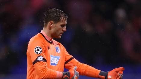 LYON, FRANCE - NOVEMBER 07:  Oliver Baumann of 1899 Hoffenheim reacts to Olympique Lyonnais scoring there second goal during the UEFA Champions League Group F match between Olympique Lyonnais and TSG 1899 Hoffenheim at Groupama Stadium on November 7, 2018 in Lyon, France.  (Photo by Alex Grimm/Getty Images)
