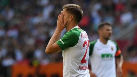 Augsburg's Icelandic striker Alfred Finnbogason reacts after a missed chance during the German first division Bundesliga football match FC Augsburg v FC Union Berlin in Augsburg, southern Germany on August 24, 2019. (Photo by Christof STACHE / AFP) / RESTRICTIONS: DFL REGULATIONS PROHIBIT ANY USE OF PHOTOGRAPHS AS IMAGE SEQUENCES AND/OR QUASI-VIDEO        (Photo credit should read CHRISTOF STACHE/AFP via Getty Images)