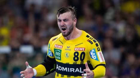 MANNHEIM, GERMANY - APRIL 21: Jannik Kohlbacher of Rhein-Neckar Loewen celebrates a goal during the DKB HBL match between Rhein-Neckar Loewen and SG Flensburg-Handewitt at SAP Arena on April 21, 2019 in Mannheim, Germany. (Photo by Simon Hofmann/Bongarts/Getty Images)