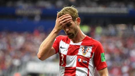 MOSCOW, RUSSIA - JULY 15:  Ivan Strinic of Croatia stands dejected during the 2018 FIFA World Cup Final between France and Croatia at Luzhniki Stadium on July 15, 2018 in Moscow, Russia.  (Photo by Matthias Hangst/Getty Images)