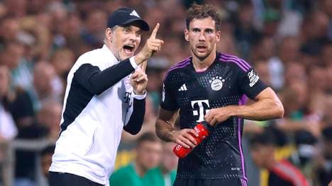 Thomas Tuchel (l.) und Leon Goretzka