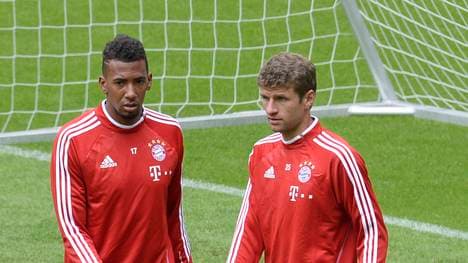 Thomas Müller (r.) und Jerome Boateng spielen gemeinsam für den FC Bayern