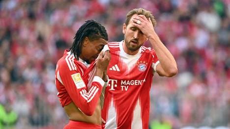 Michael Olise (l.) neben Harry Kane