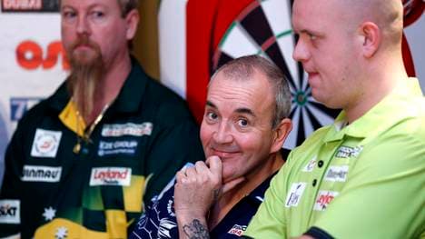 DUBAI, UNITED ARAB EMIRATES - MAY 28:  (L-R) Simon Whitlock, Phil Taylor and Michael Van Gerwen are pictured during the draw ceremony for the Dubai Duty Free Darts Masters to reveal the Quarter Final matches at Dubai Duty Free Tennis Stadium, Irish Village, on May 28, 2014 in Dubai, United Arab Emirates.  (Photo by Francois Nel/Getty Images)