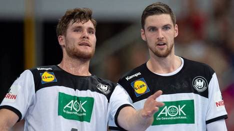 Johannes Golla (l.) hofft auf eine Rückkehr von Hendrik Pekeler ins Nationalteam