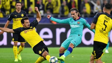 Mats Hummels blockt Antoine Griezmann beim Torschuss