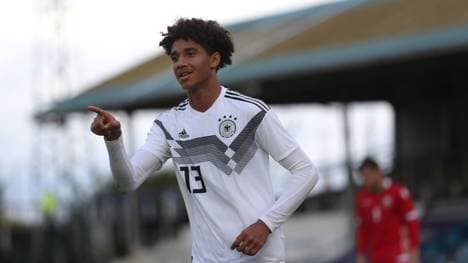 GREENOCK, SCOTLAND - OCTOBER 12: Kevin Schade of Germany celebrates scoring his team's third goal and completes his hat trick during the UEFA Under 19 European qualifier match between Belarus and Germany at Cappielow Park on October 12, 2019 in Greenock, Scotland. (Photo by Ian MacNicol/Getty Images for DFB)