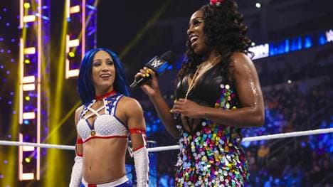 Sasha Banks (l.) und Naomi wollen bei WWE nun gemeinsam Titelgold