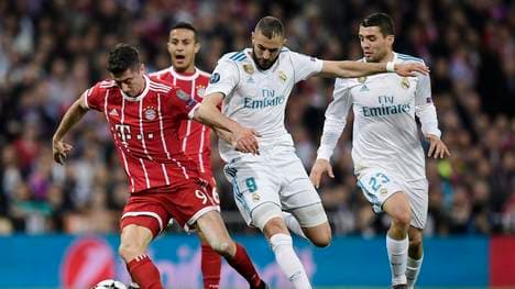 Karim Benzema (M., gegen Robert Lewandowski) wurde den Bayern im Tausch mit dem Polen angeboten