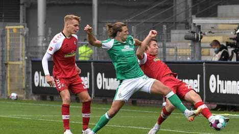 Torschützen unter sich: Freiburgs Philipp Lienhart (links) und Bremens Niclas Füllkrug, dazu noch Dominique Heintz