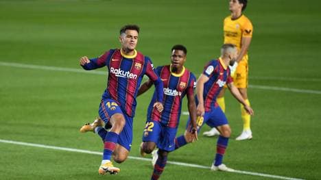 Philippe Coutinho (li.) nach seinem Ausgleich gegen den FC Sevilla