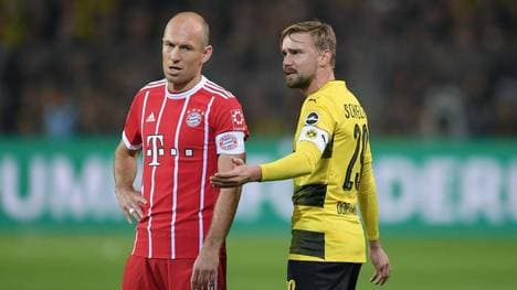 Arjen Robben (l.) bereitete Marcel Schmelzer (r.) Probleme - und umgekehrt