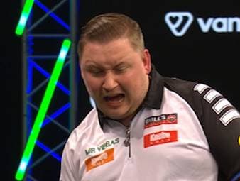 Martin Schindler besiegt Stephen Bunting im Decider und holt somit einen wichtigen Sieg beim Grand Slam of Darts, der die Hoffnung auf das Achtelfinale am Leben hält.