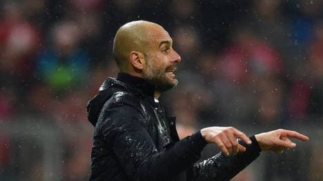 Pep Guardiola vom FC Bayern im Regen
