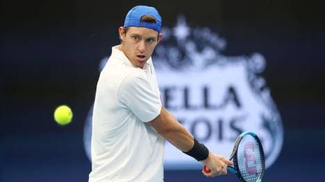 BRISBANE, AUSTRALIA - JANUARY 04: Nicolas Jarry of Chile plays a shot against Benoit Paire of France during day two of the 2020 ATP Cup Group Stage at Pat Rafter Arena on January 04, 2020 in Brisbane, Australia. (Photo by Jono Searle/Getty Images)