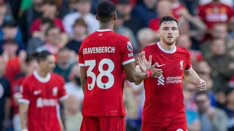 Brighton and Hove Albion v Liverpool Premier League 08 10 2023. Liverpool midfielder Ryan Gravenberch (38) congratulates Liverpool defender Andrew Robertson (26) during the Premier League match between Brighton and Hove Albion and Liverpool at the American Express Stadium, Brighton and Hove, England on 8 October 2023. Brighton and Hove American Express Stadium East Sussex England Editorial use only DataCo restrictions apply See www.football-dataco.com , Copyright: xJanexStokesx PSI-18199-0150