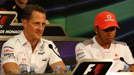 Lewis Hamilton (r.) und Michael Schumacher fuhren zeitweise beide gleichzeitig in der Formel 1