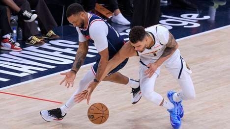 Michael Porter jr. (r.) wird von den Denver Nuggets zu den Brooklyn Nets getradet