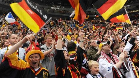 Germany's fans cheer during the IIHF Ice