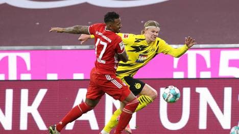 Jerome Boateng im Zweikampf mit Erling Haaland