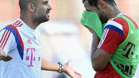 Pep Guardiola (l.) ist seit 2013 Trainer beim FC Bayern