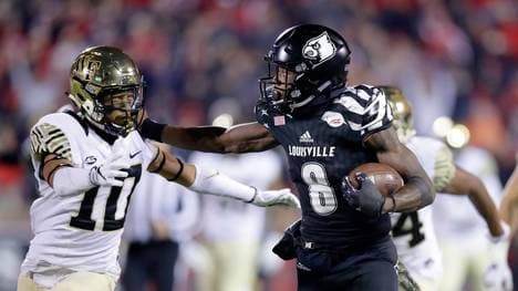 Lamar Jackson (r.) ist von seinen Gegenspielern nur selten zu stoppen