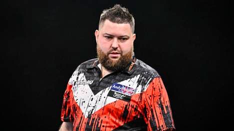 Michael Smith hat beim German Darts Grand Prix sein Auftaktmatch gegen Krzysztof Ratajski verloren