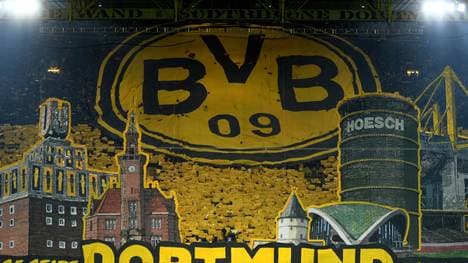 Dortmund's supporters of the south stands (Suedtribuene) present a choreography ahead of kick off for the German first division Bundesliga football match BVB Borussia Dortmund vs Eintracht Frankfurt, in Dortmund, western Germany on February 14, 2020. (Photo by INA FASSBENDER / AFP) / RESTRICTIONS: DFL REGULATIONS PROHIBIT ANY USE OF PHOTOGRAPHS AS IMAGE SEQUENCES AND/OR QUASI-VIDEO (Photo by INA FASSBENDER/AFP via Getty Images)