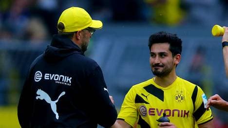 Ilkay Guendogan (r.) wird Borussia Dortmund laut Watzke im Sommer verlassen