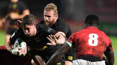 Sebastian Ferreira (l.) war mit drei Versuchen bester deutscher Spieler