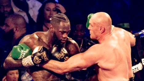 Deontay Wilder (l.) will sich gegen Tyson Fury den Schwergewichtstitel sichern