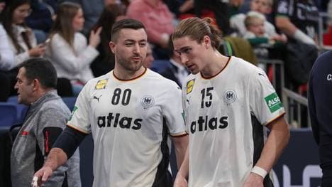 Jannik Kohlbacher (l.) fehlt im deutschen Aufgebot für das Hauptrundenduell bei der Handball-EM gegen Portugal