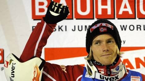 Norway's Bjoern Einar Romoeren (C) celeb