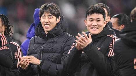 Hiroki Ito (l. mit Minjae Kim) klatscht Beifall