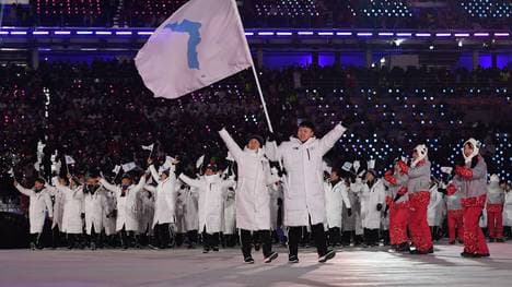 Die Mannschaften von Nord- und Südkorea sind gemeinsam eingelaufen