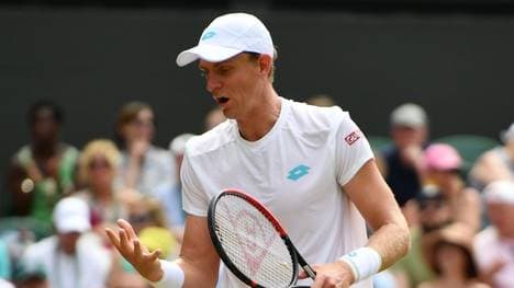 South Africa's Kevin Anderson reacts after a point against Argentina's Guido Pella during their men's singles third round match on the fifth day of the 2019 Wimbledon Championships at The All England Lawn Tennis Club in Wimbledon, southwest London, on July 5, 2019. (Photo by Daniel LEAL-OLIVAS / AFP) / RESTRICTED TO EDITORIAL USE        (Photo credit should read DANIEL LEAL-OLIVAS/AFP/Getty Images)