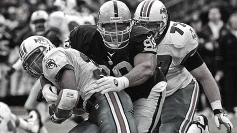 Kevin Johnson (M.) 1997 im Trikot der Oakland Raiders