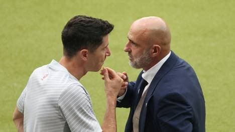 Robert Lewandowski (l.) und Michal Probierz