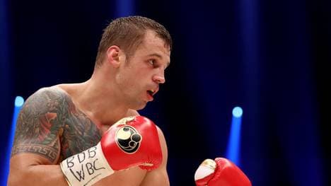 DORTMUND, GERMANY - APRIL 01:  Mairis Briedis of Latvia in action against Marco Huck of Germany during their WBC Cruiserweight World Championship title fight at Westfalenhalle on April 1, 2017 in Dortmund, Germany.  (Photo by Martin Rose/Bongarts/Getty Images)