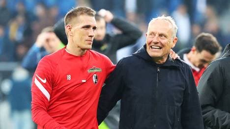 Nils Petersen (l.) und Christian Streich arbeiten auch in der neuen Saison in Freiburg zusammen