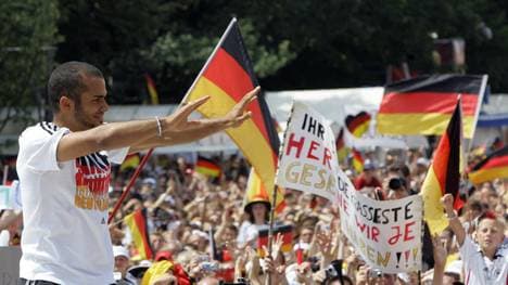 German midfielder David Odonkor waves to